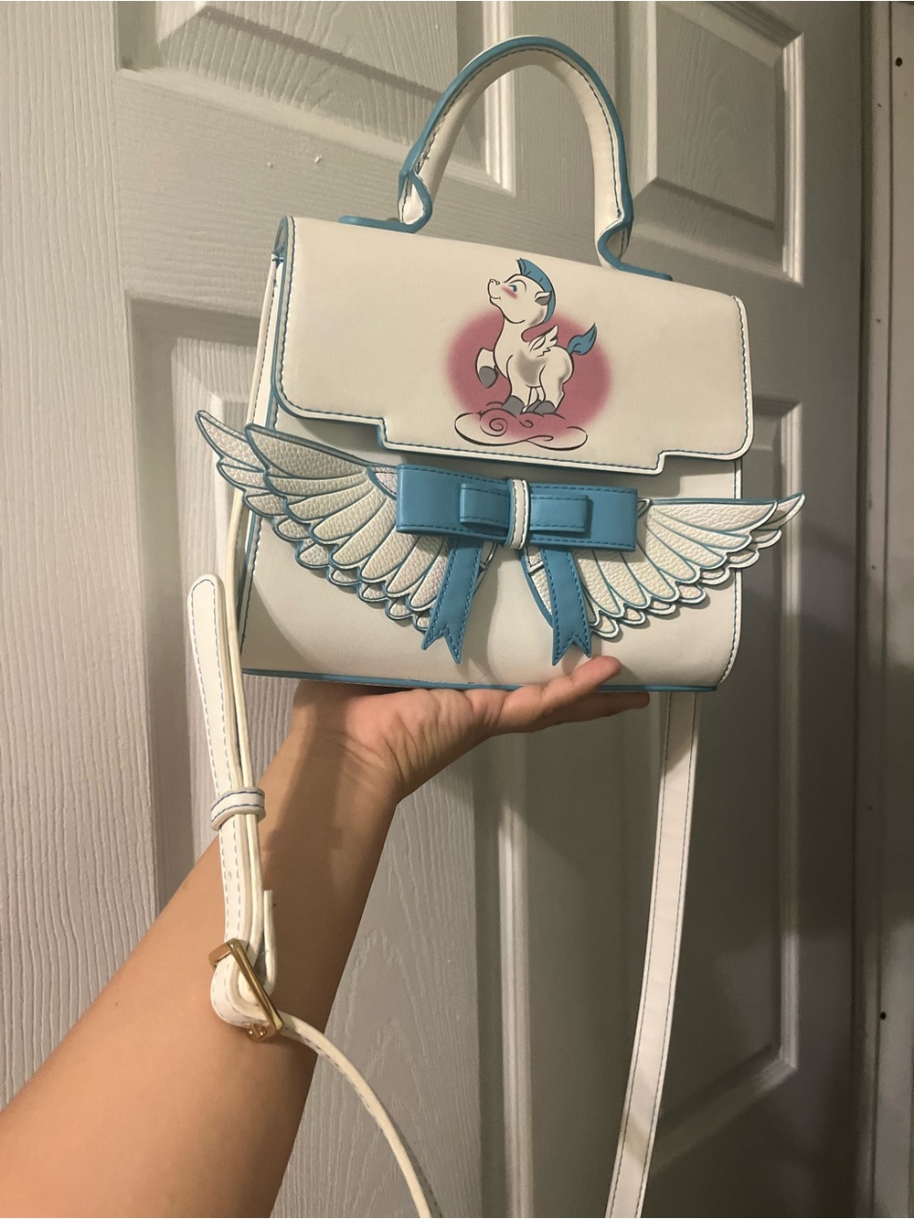 White and Light Blue Winged Crossbody Bag with Unicorn Motif